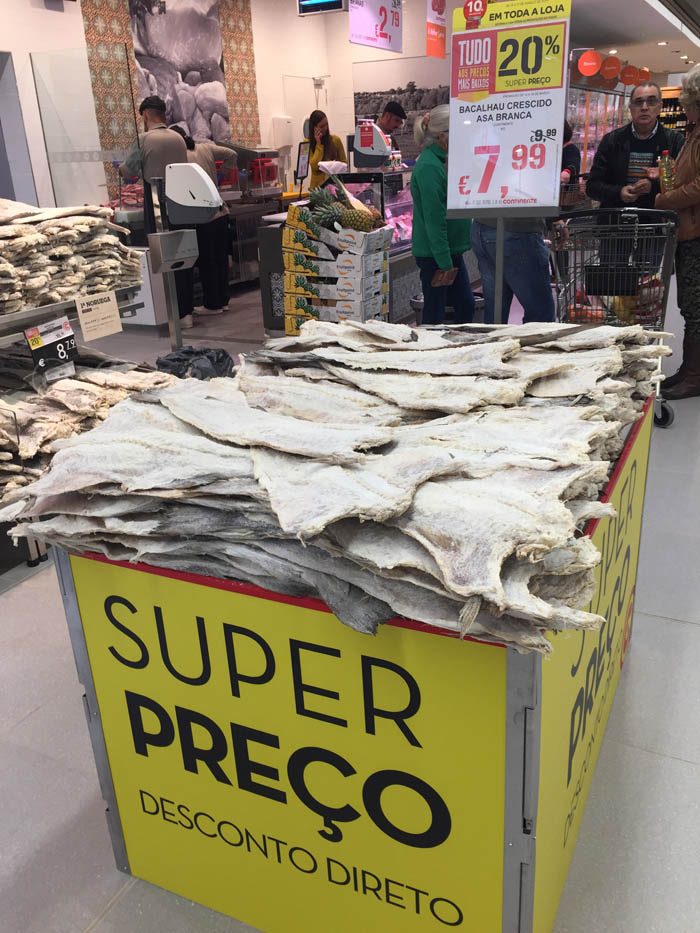 Grocery display of dried, salted cod.