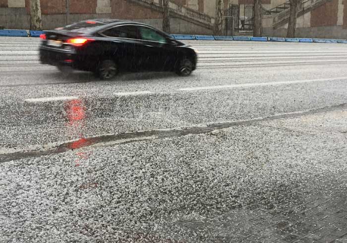 Surprise hail storm in Madrid Spain